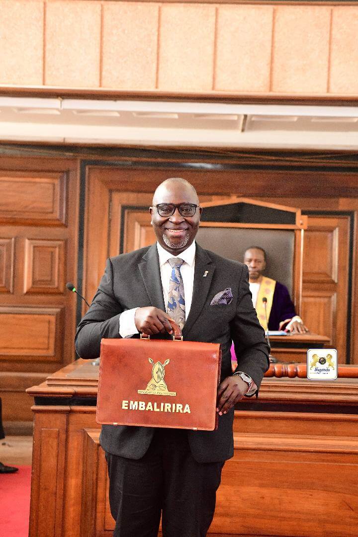 Buganda Kingdom Treasurer – Hon. Robert Waggwa Nsibirwa presenting the budget to the Buganda Lukiiko Buganda Kingdom Treasurer – Hon. Robert Waggwa Nsibirwa presenting the budget to the Buganda Lukiiko